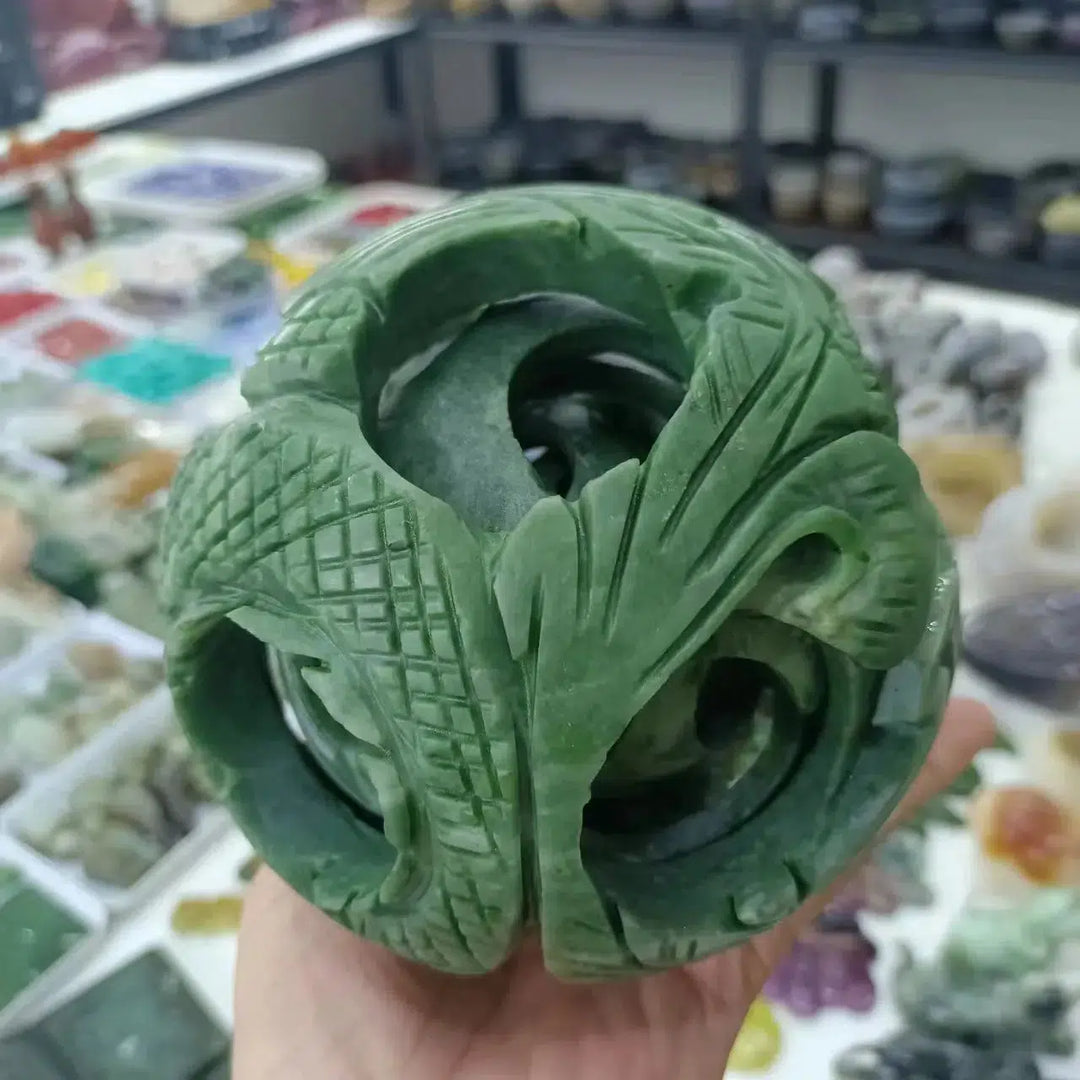 Cyan Jade Carved Inclusion Sphere