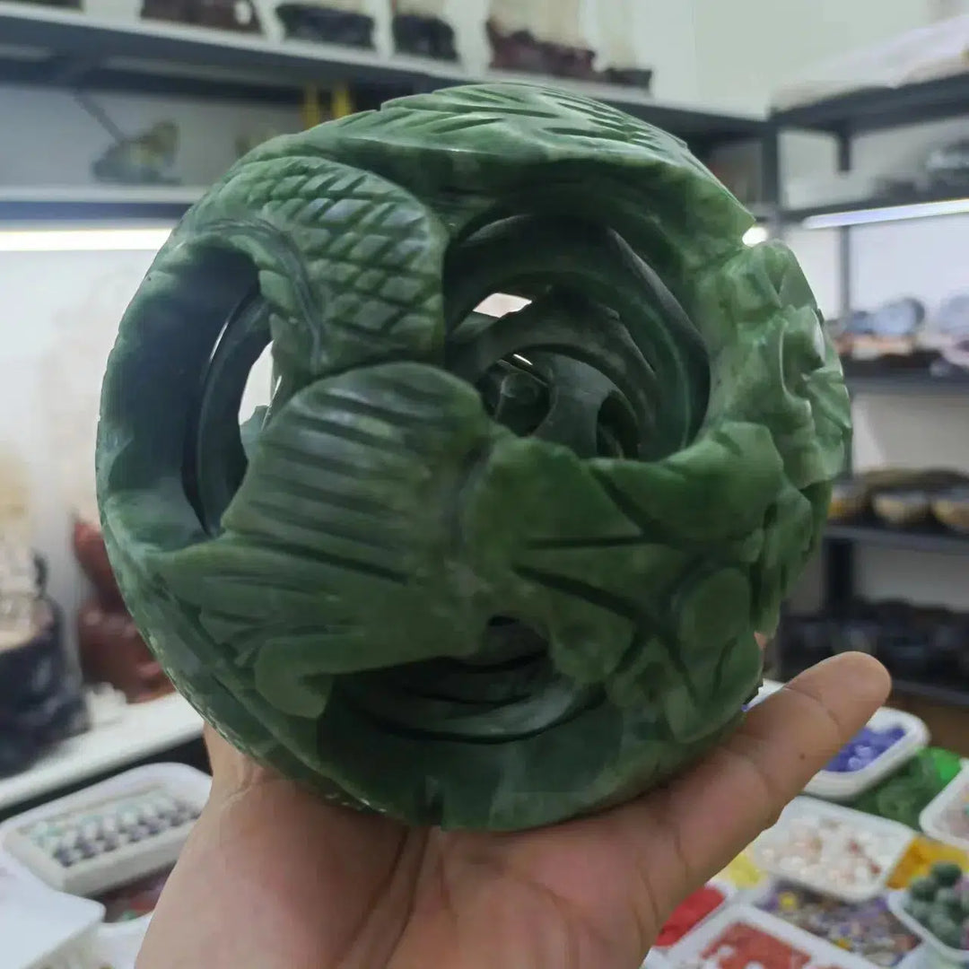 Cyan Jade Carved Inclusion Sphere