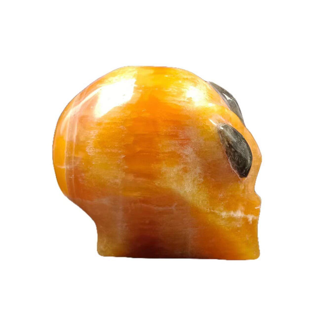 Orange Calcite Alien Skull