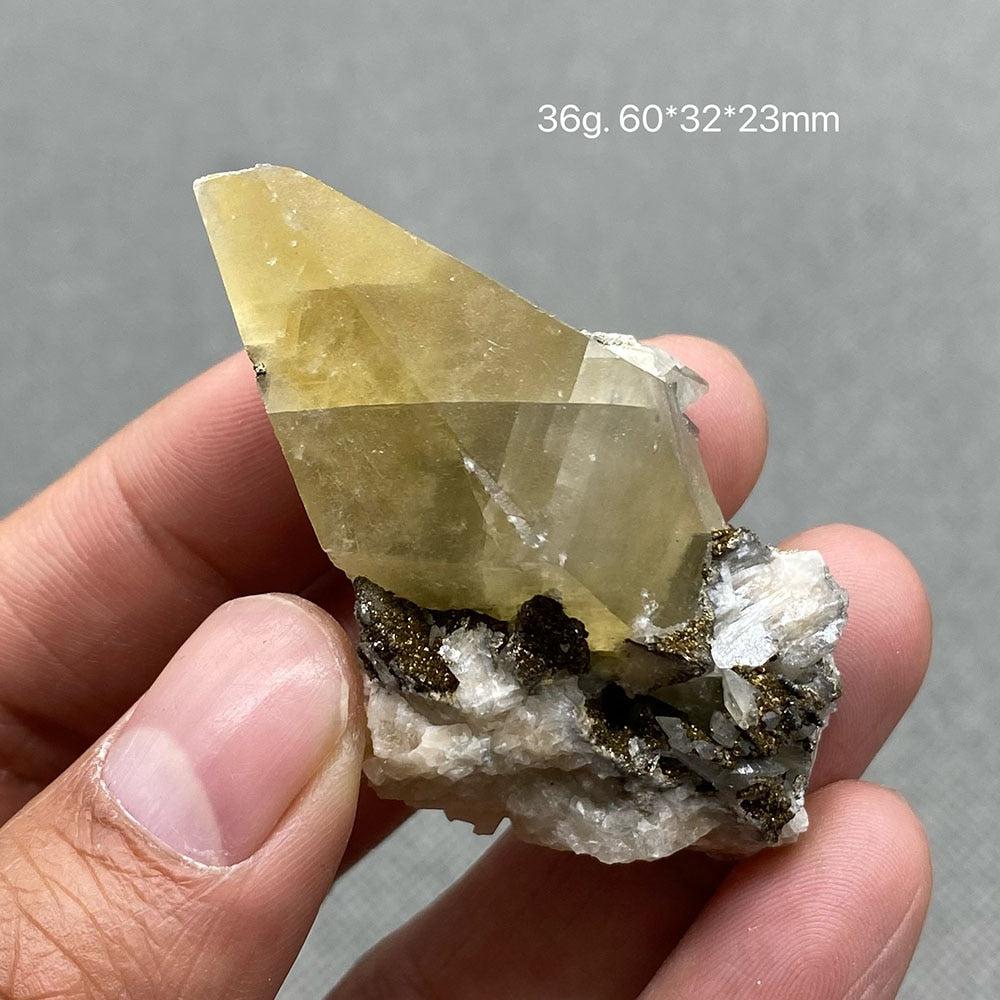 Yellow Calcite Crystal with Pyrite